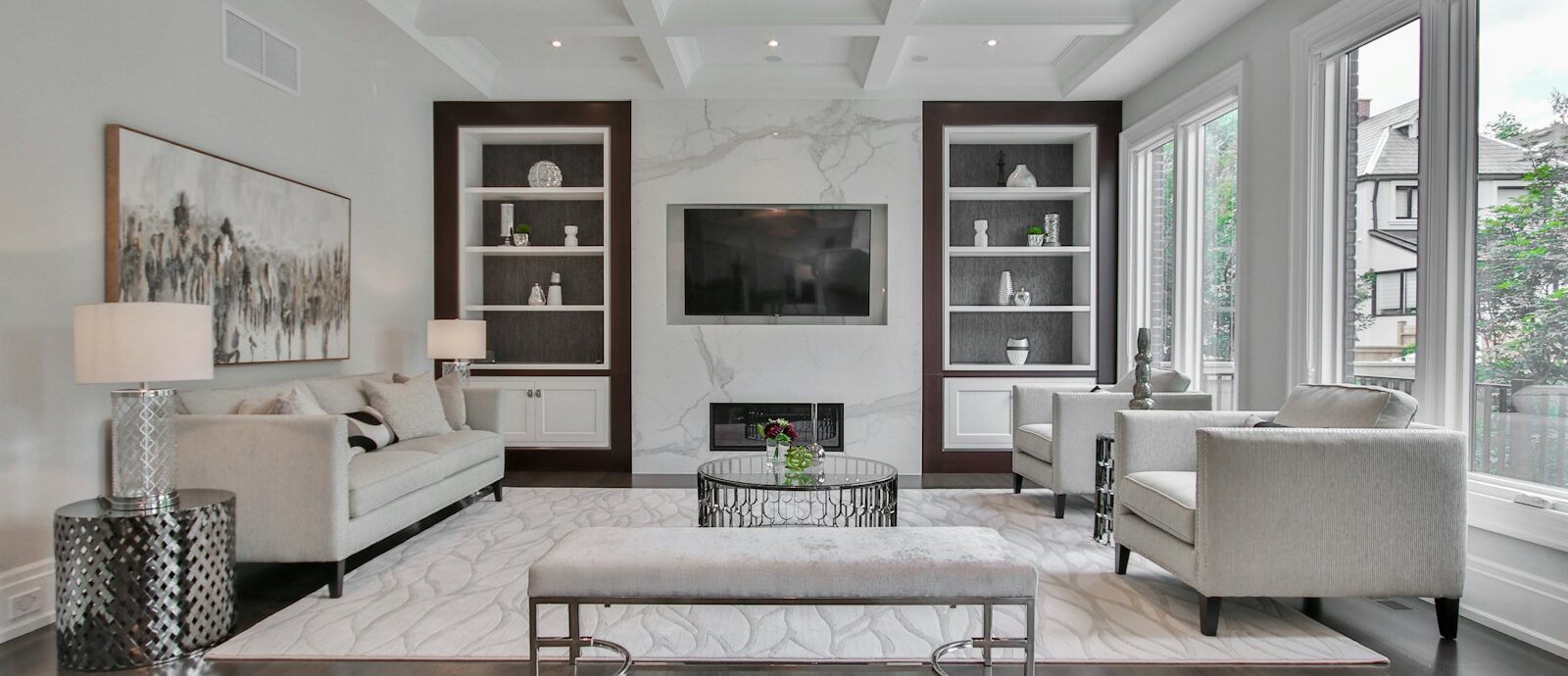 white wooden coffee table near white sofa
